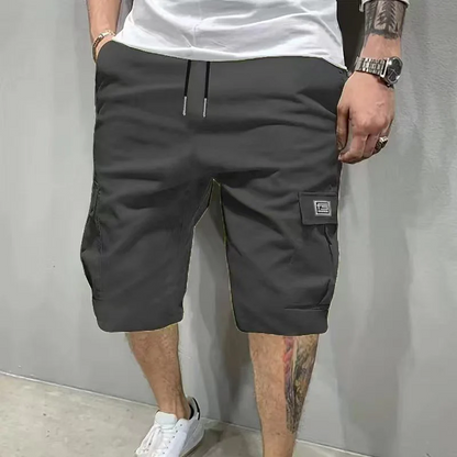 Lightweight Cargo Shorts – Breathable fabric, knee-length cut. Secure pockets for phone & keys. Comfortable all day long.