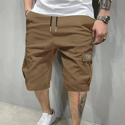 Lightweight Cargo Shorts – Breathable fabric, knee-length cut. Secure pockets for phone & keys. Comfortable all day long.